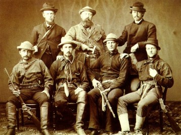 Marsh (back row and center), surrounded by armed assistants for an1872 expedition.